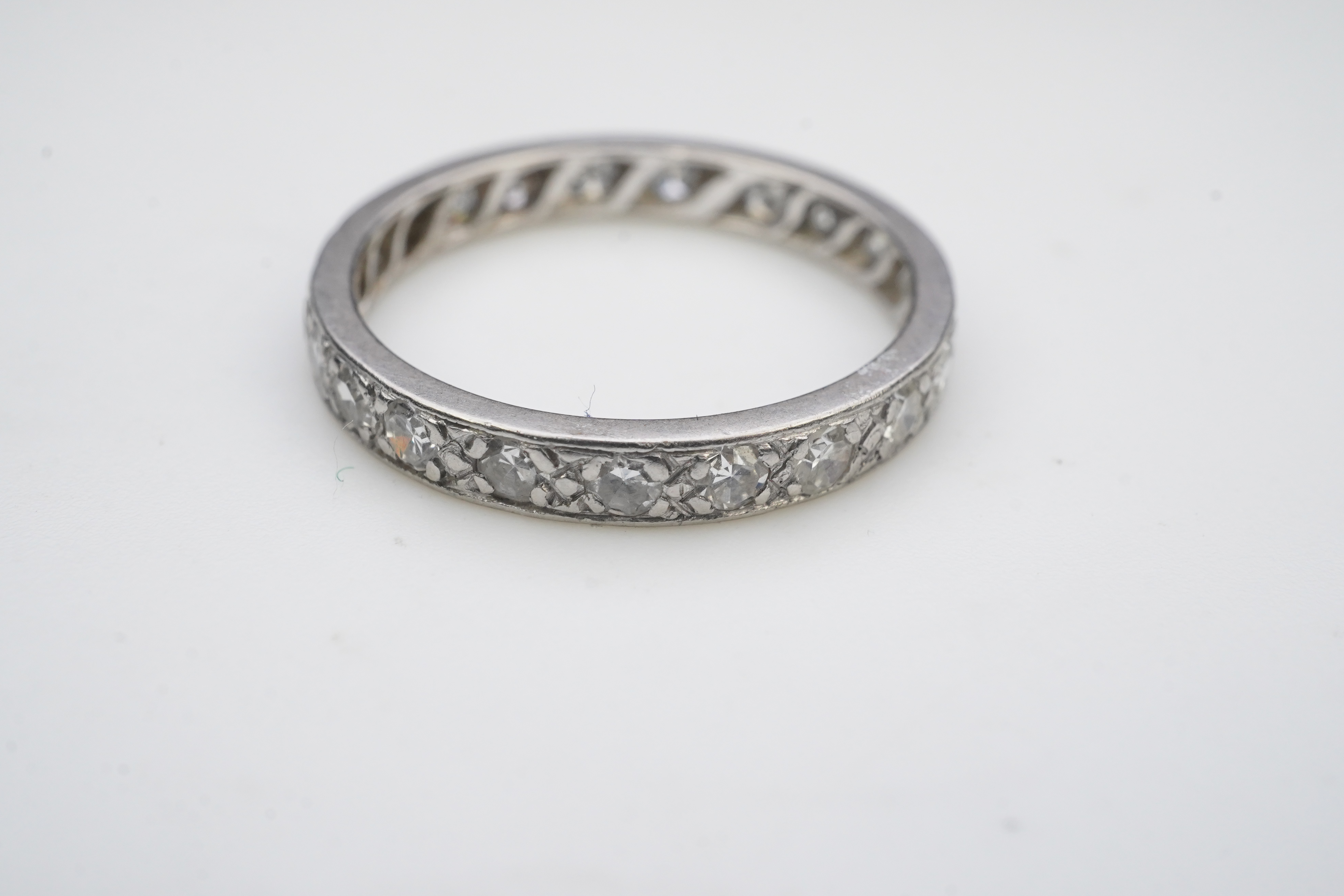 A diamond eternity ring, mid 20th century